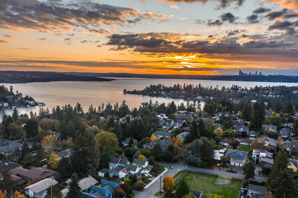 Aerial view of Lake Washington waterfront homes in Bellevue at sunset
