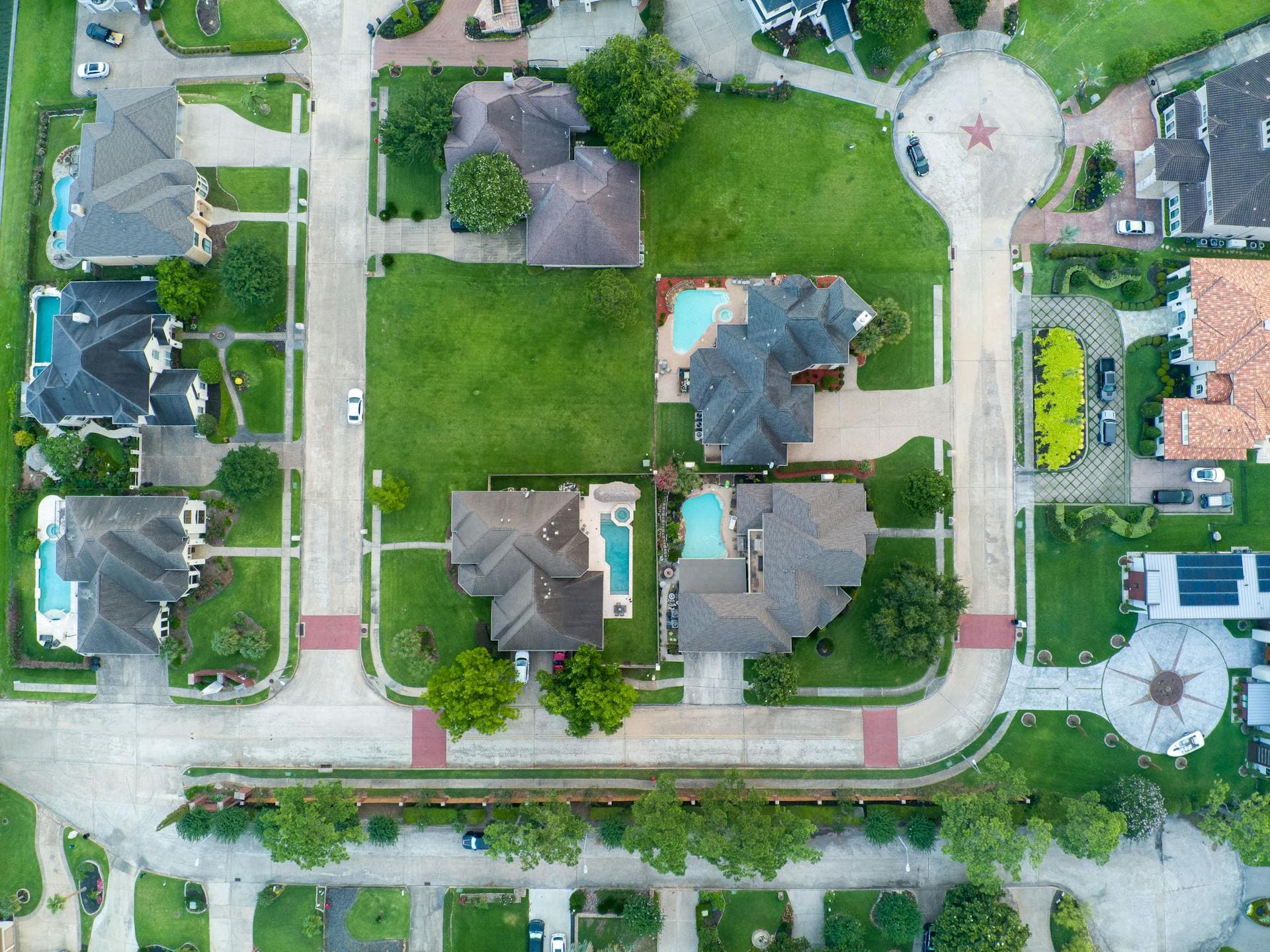 Aerial view of Houston Texas suburban neighborhood with pools