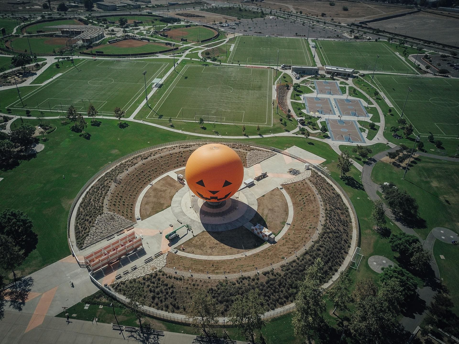 Aerial view of iconic Great Park Balloon in Irvine California surrounded by sports fields and greenery