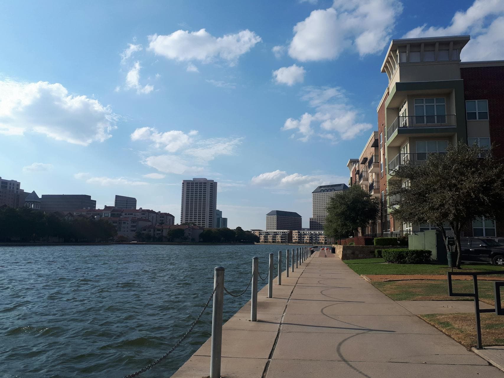 Riverside urban pathway with cityscape view in Irving, Texas