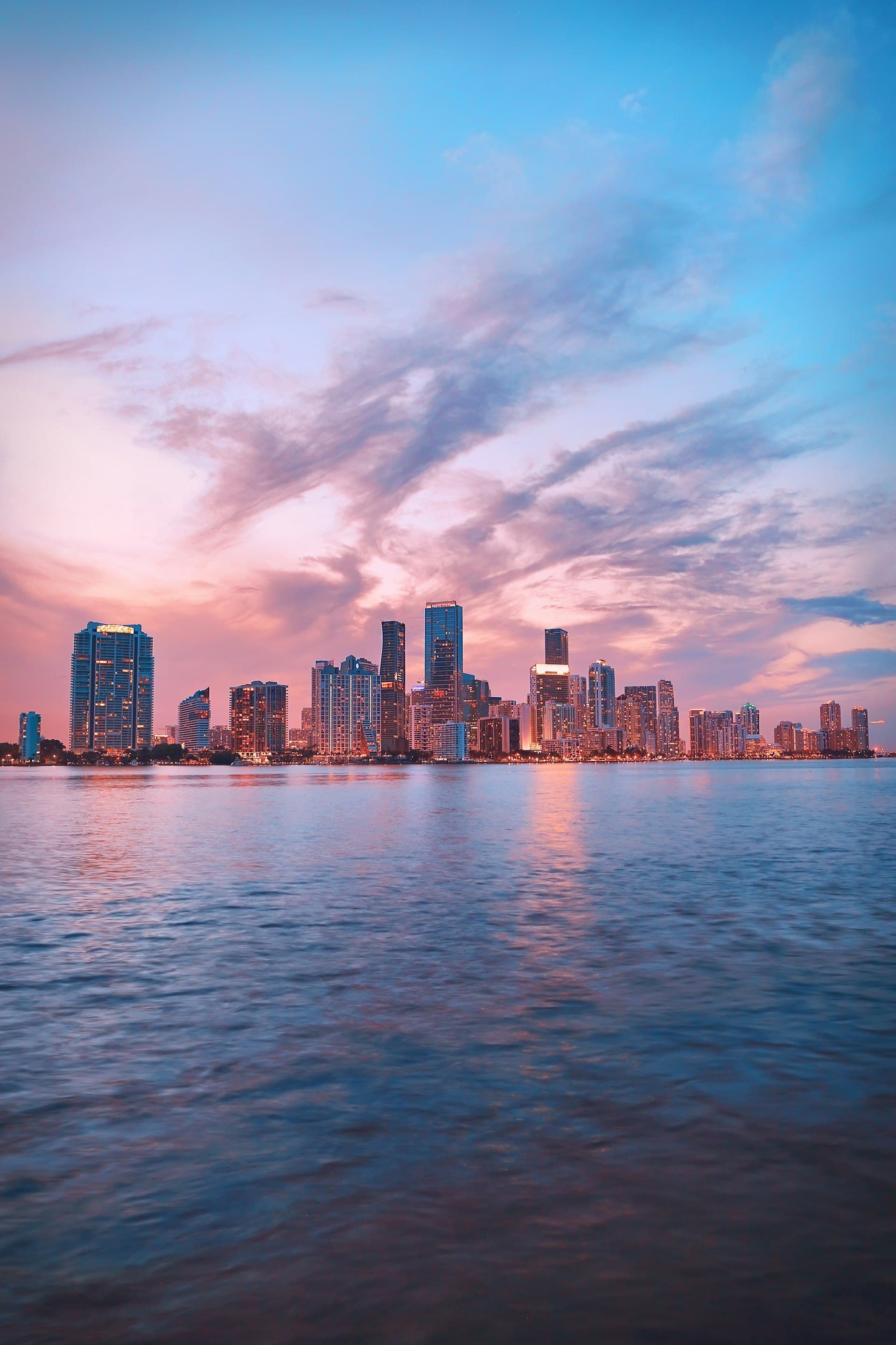Miami skyline at sunset across Biscayne Bay