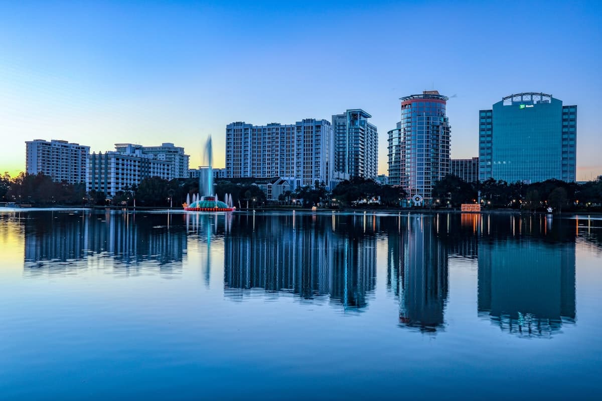 Lake Eola fountain and downtown Orlando skyline at dusk