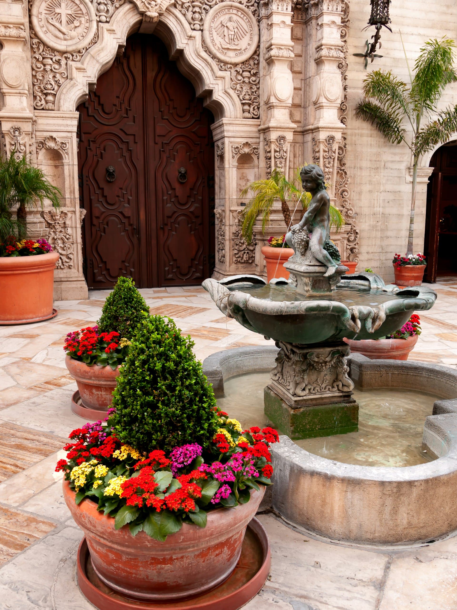 Mission Inn courtyard fountain with Spanish colonial architecture in downtown Riverside California