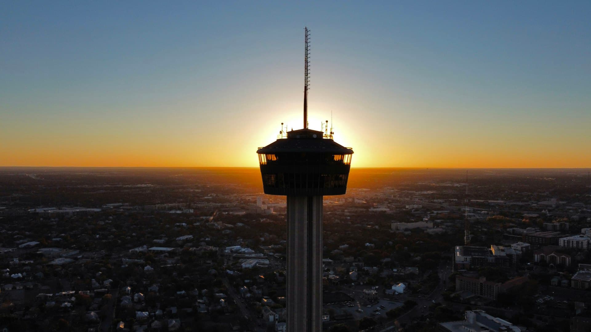 Tower of the Americas in San Antonio Texas at sunset with city skyline