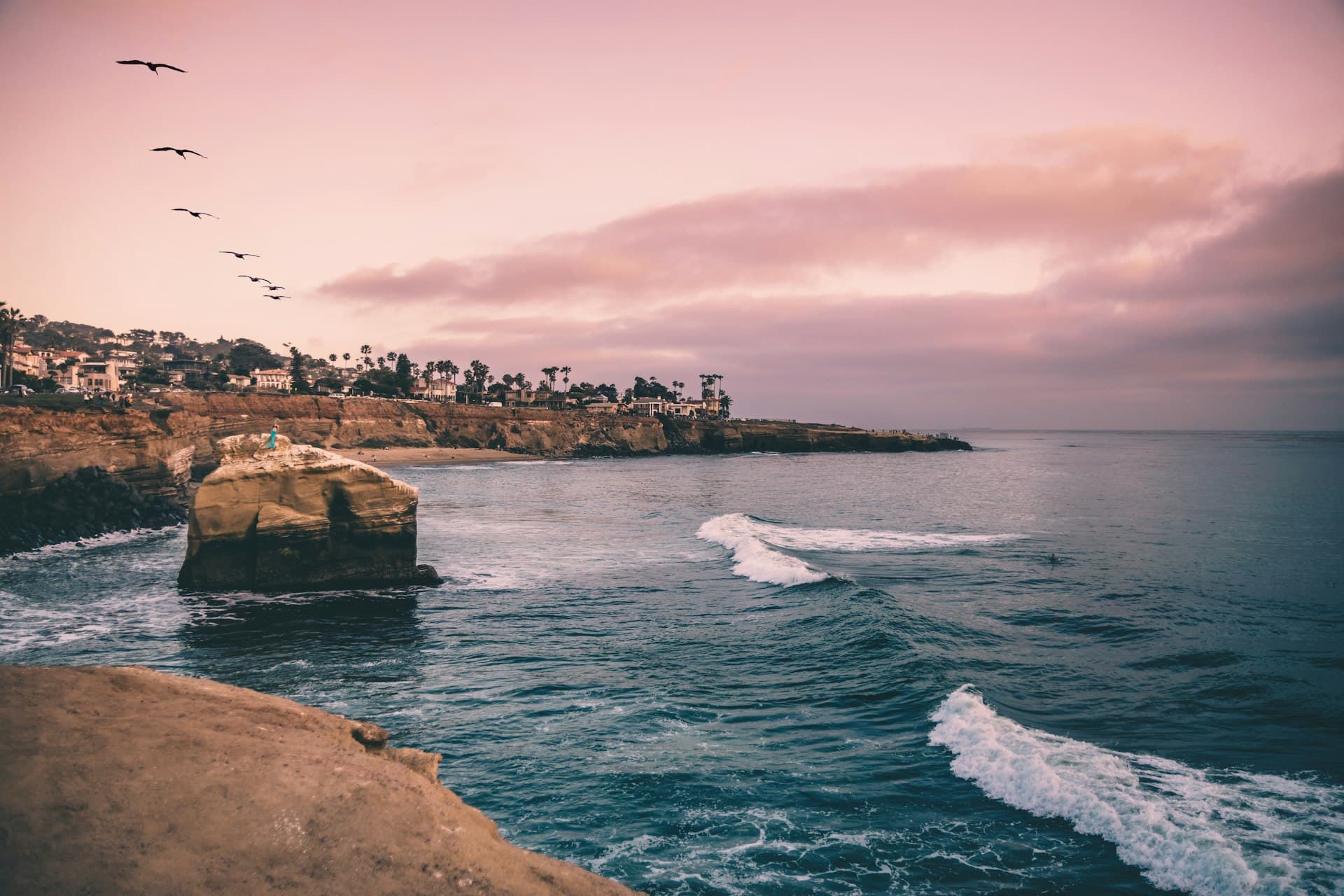 San Diego coastal cliffs and ocean waves at sunset